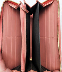 Portefeuille Gucci cuir rose avec nœud GG