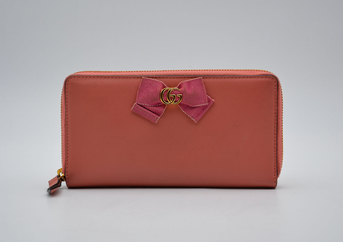 Portefeuille Gucci cuir rose avec nœud GG