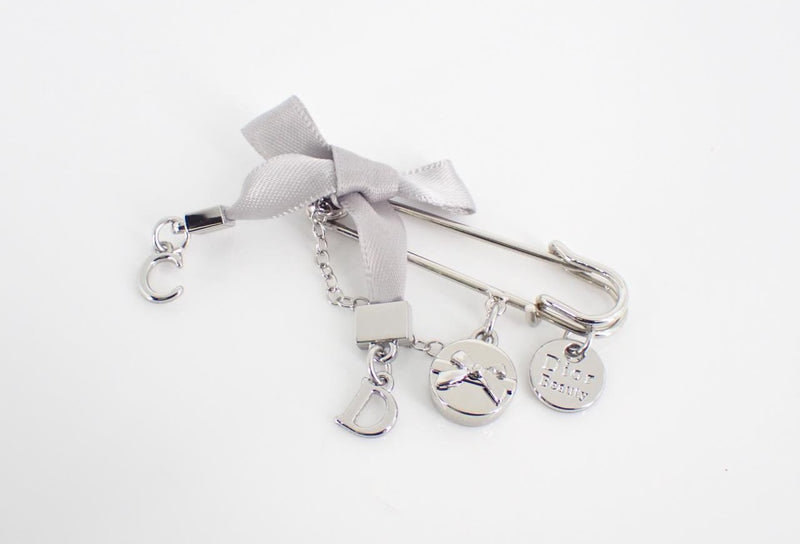 Dior Silver-Tone Safety Pin Brooch with Charms
