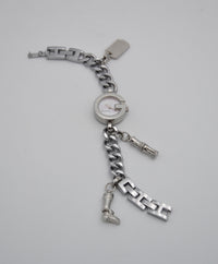 Montre Gucci 107 G vintage à charms