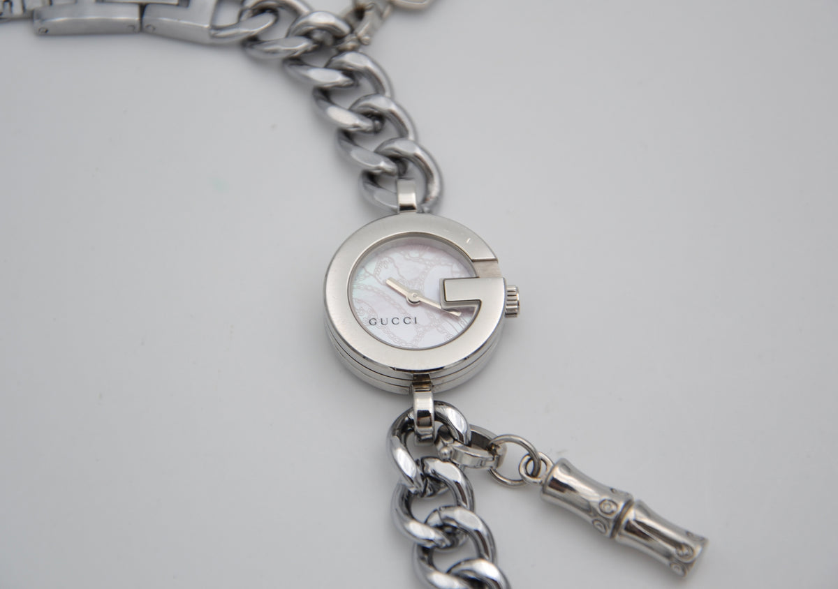 Montre Gucci 107 G vintage à charms