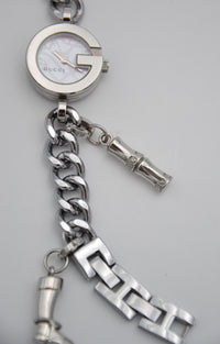 Montre Gucci 107 G vintage à charms