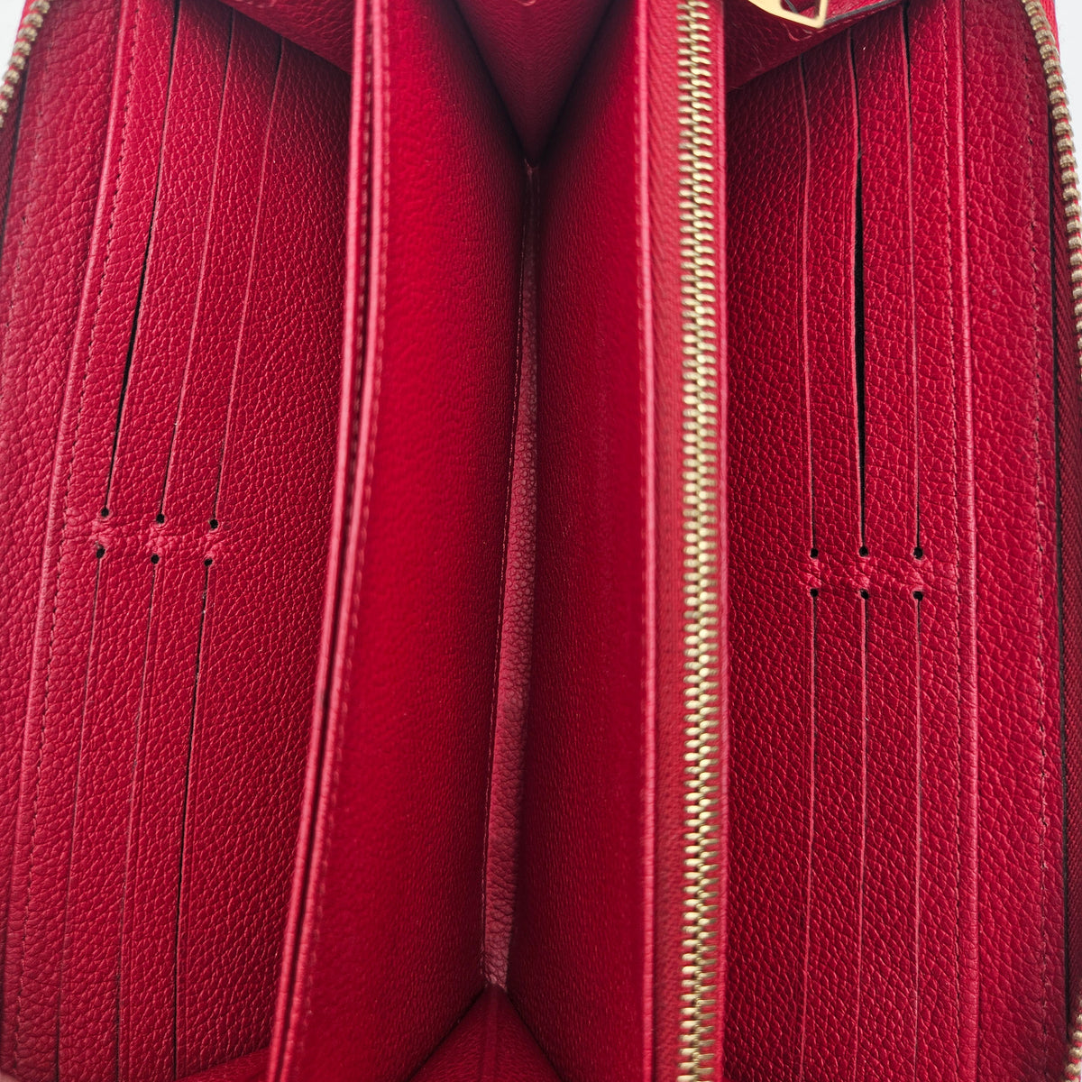 Portefeuille Louis Vuitton Zippy Continental cuir Empreinte
