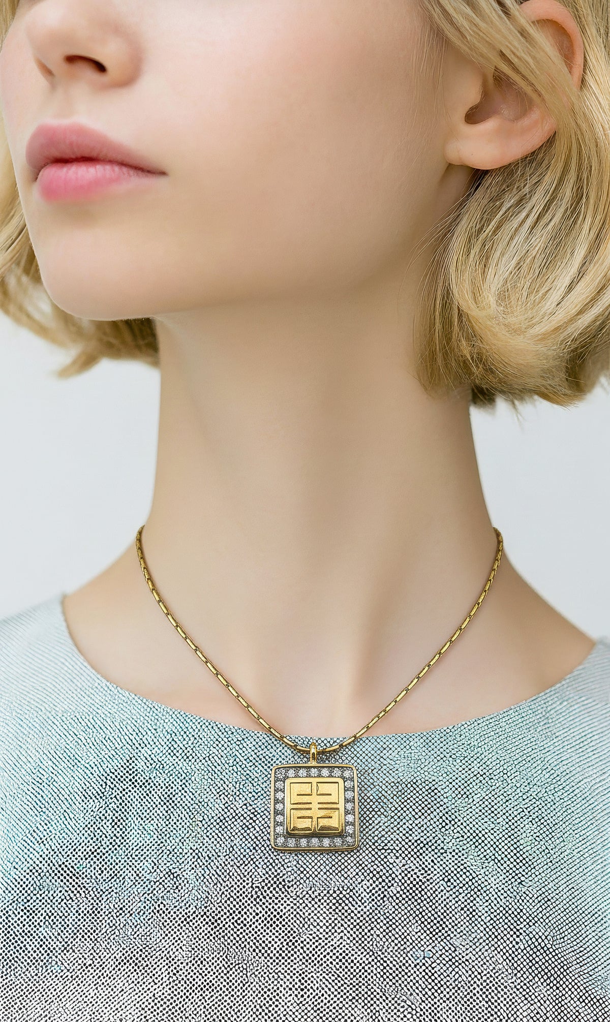 Vintage 1980 Givenchy Logo Pendant Necklace – Gold Tone with Rhinestone Border