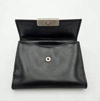 Portefeuille compact Prada en cuir noir