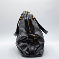 Muse Yves Saint Laurent cuir vernis