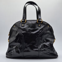 Muse Yves Saint Laurent cuir vernis