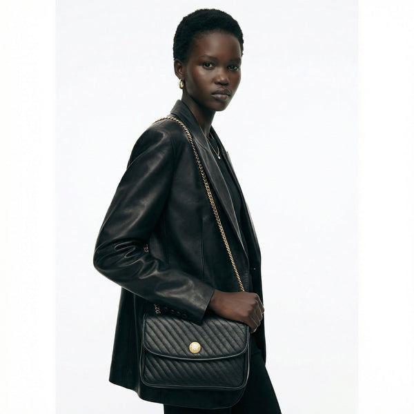 Sac Céline vintage matelassé en cuir noir & chaîne dorée