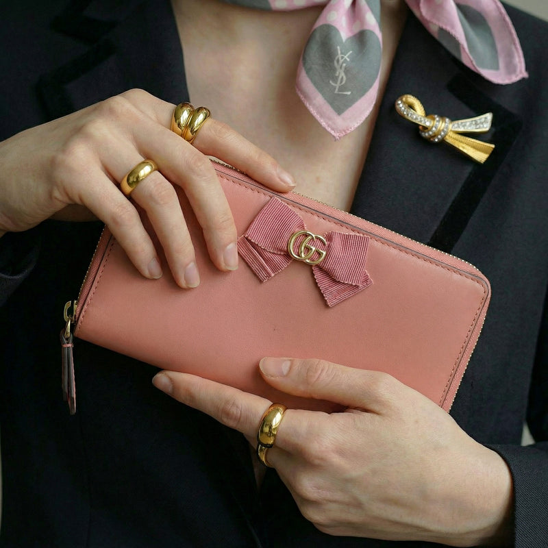 Portefeuille Gucci cuir rose avec nœud GG