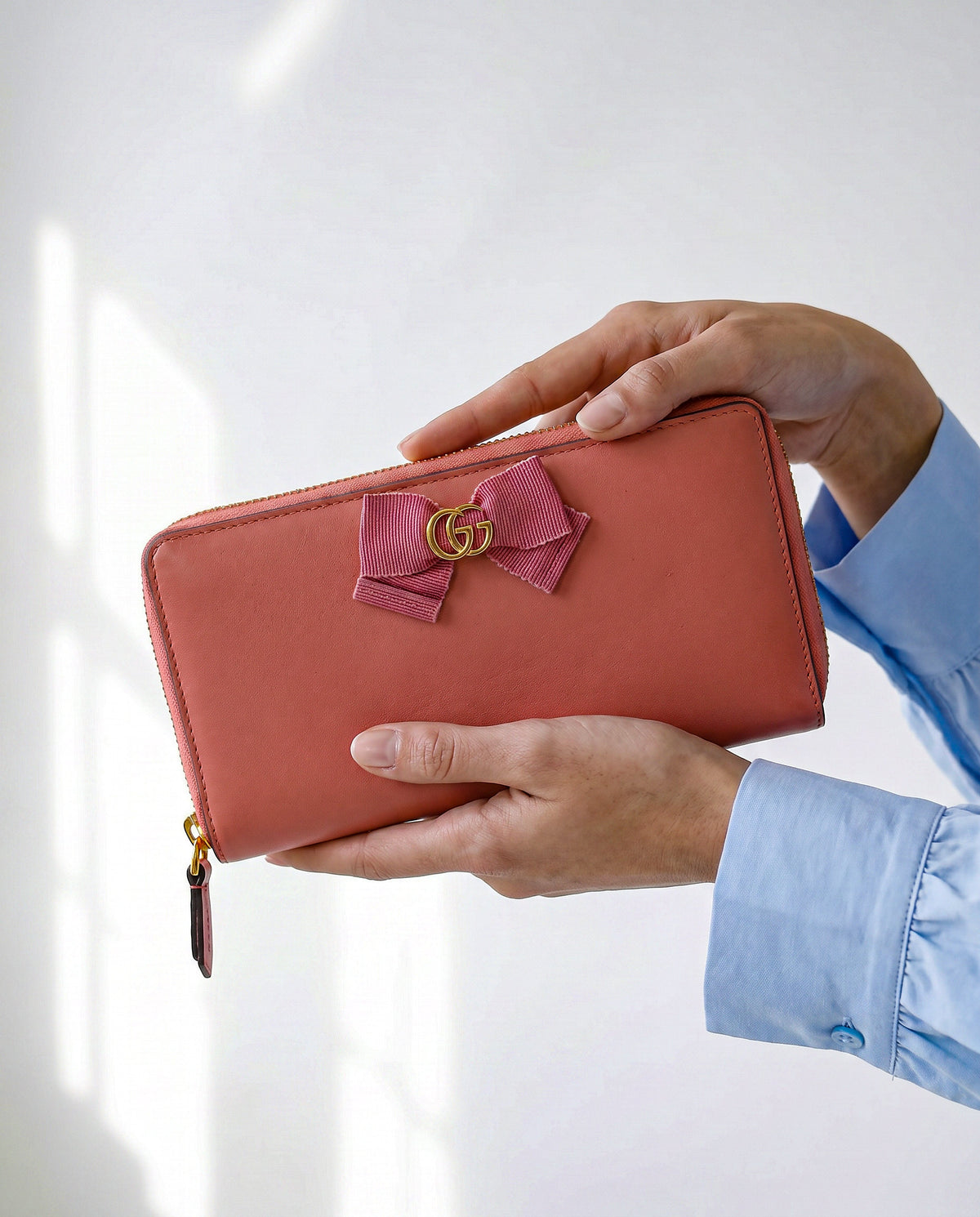 Portefeuille Gucci cuir rose avec nœud GG