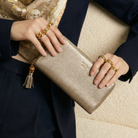 Portefeuille Gucci cuir grainé doré Bamboo zippy