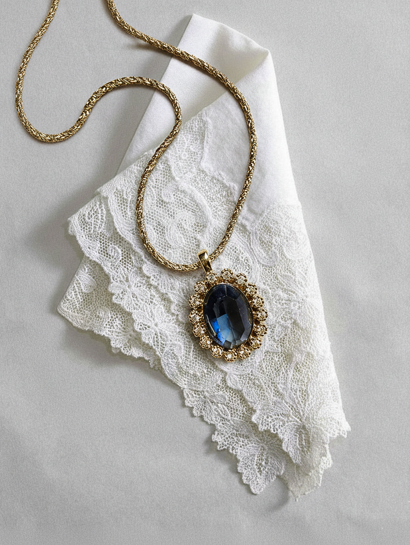 Nina Ricci Gold-Tone Necklace with Blue Crystal Pendant