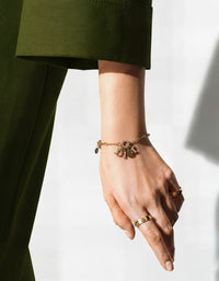 Dior Gold-Tone Charm Bracelet with Logo & Clover