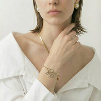 Dior Gold-Tone Charm Bracelet with Logo & Clover