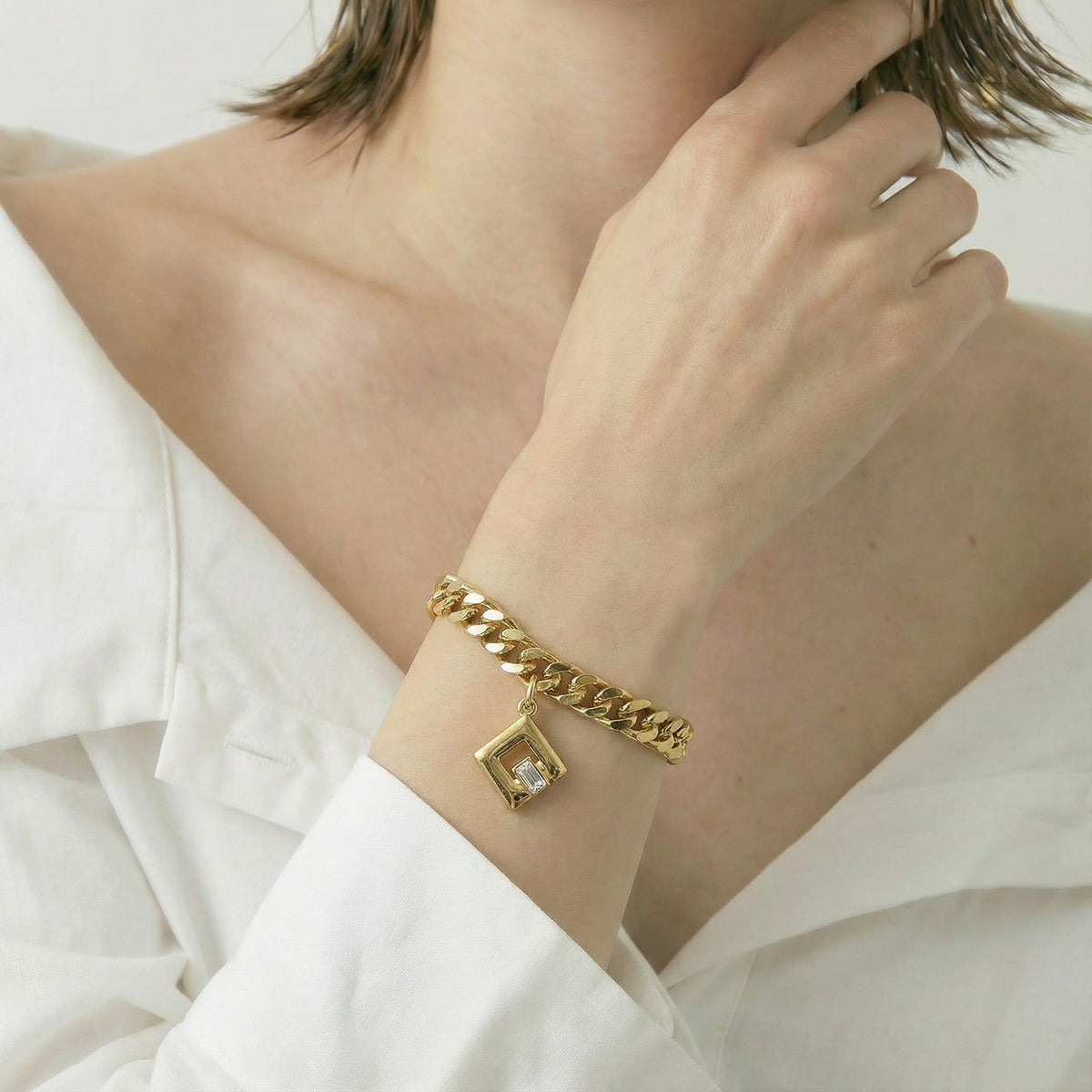 Vintage Givenchy Gold-Tone Chain Bracelet with Geometric Crystal Charm