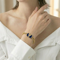 Valentino Gold-Tone Chain Bracelet with Enamel V Logo