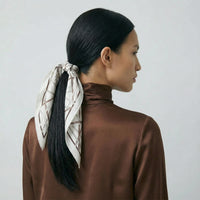 Hermès Triangle Scarf – Ribbon Motif in Neutrals