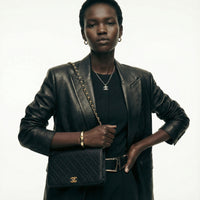 Vintage Chanel Timeless Single Flap Bag in Black Lambskin Leather