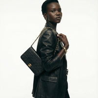 Vintage Chanel Timeless Single Flap Bag in Black Lambskin Leather